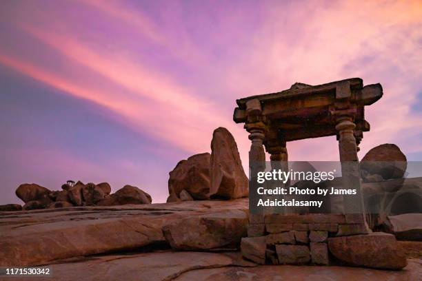 hemakuta hill temple complex, hampi - humpi stock pictures, royalty-free photos & images