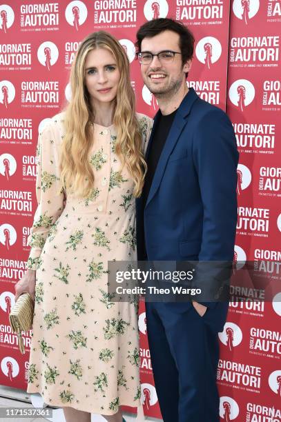 Brit Marling and guest attend the MiuMiu photocall during the 76th Venice Film Festival at Sala Volpi on September 01, 2019 in Venice, Italy.