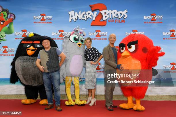 Axel Prahl, Anke Engelke and Christoph Maria Herbst attend the premiere of the movie "Angry Birds 2 - Der Film" at CineStar on September 01, 2019 in...