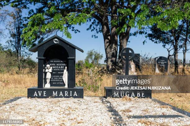 The tombstone of Bona Mugabe, mother of the late former Zimbabwean President Robert Mugabe, is seen at the Mugabe family burial grounds at a Catholic...