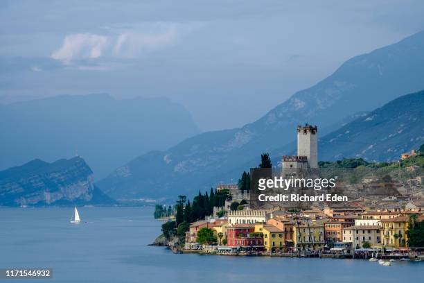 malcesine from across the lake - malcesine stock pictures, royalty-free photos & images