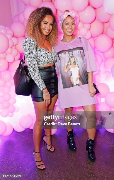 Amber Gill and Kaz Crossley attend the VIP launch of Ariana Grande's 'Thank U, Next' fragrance in Shoreditch on September 27, 2019 in London, England.