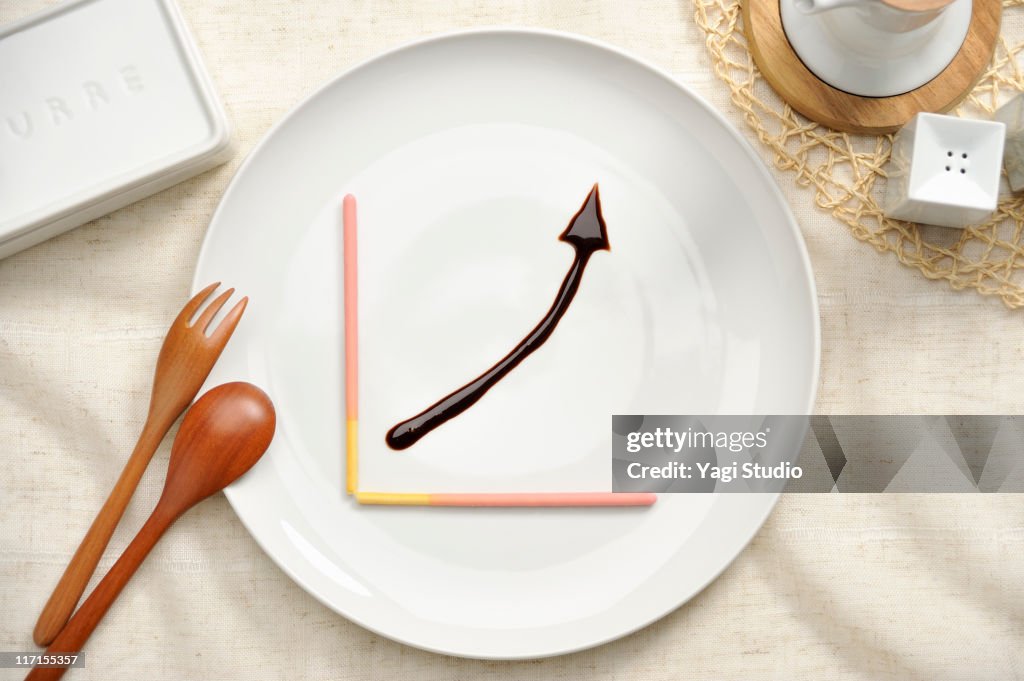 The arrow drawn in the chocolate