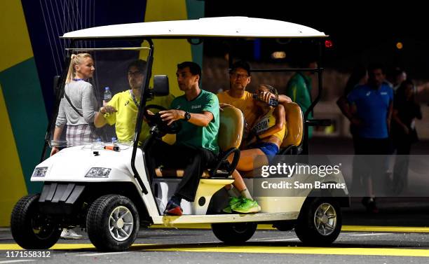 Doha , Qatar - 27 September 2019; Cecilia Norrbom of Sweden is taken for medical treatment after competing in the Women's Marathon during day one of...
