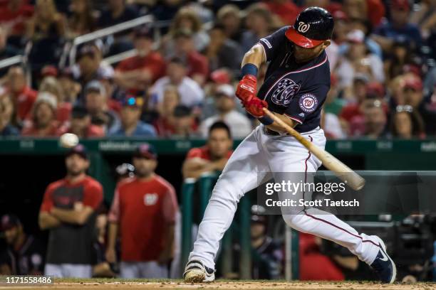 Gerardo Parra of the Washington Nationals hits an RBI double against the Cleveland Indians during the second inning at Nationals Park on September...