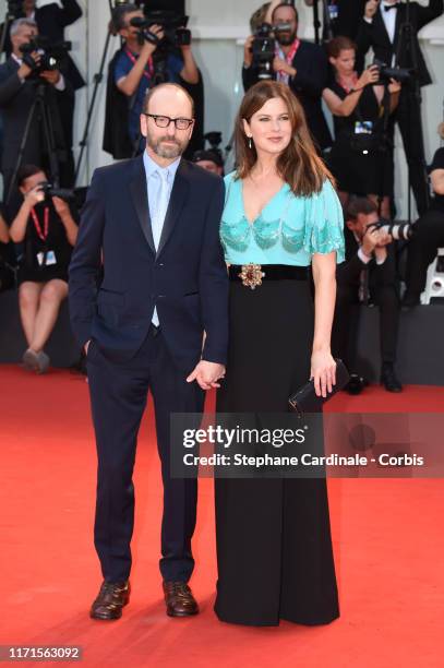 Steven Soderbergh and Jules Asner walk the red carpet ahead of the "The Laundromat" screening during the 76th Venice Film Festival at Sala Grande on...