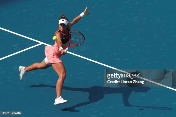 Monica Puig of Puerto Rico returns a shot against Zheng Saisai of China during women's singles first round match of 2019 China Open on September 28,...