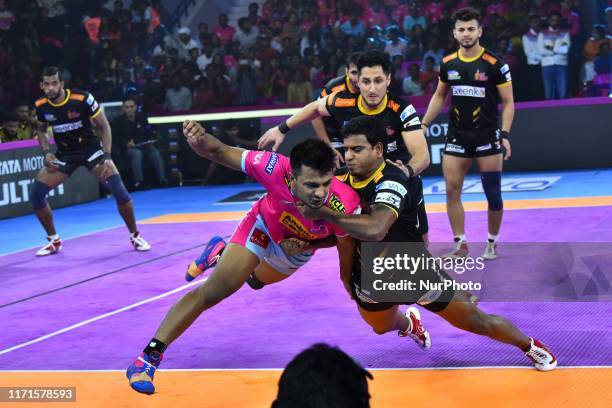 Players of Telgu Titans and Jaipur Pink Panthers in action during the Pro Kabaddi League match at SMS Indoor Stadium in Jaipur,Rajasthan, India, Sept...