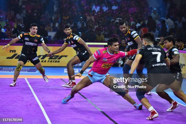 Players of Telgu Titans and Jaipur Pink Panthers in action during the Pro Kabaddi League match at SMS Indoor Stadium in Jaipur,Rajasthan, India, Sept...