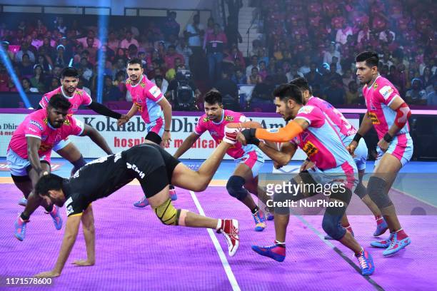 Players of Telgu Titans and Jaipur Pink Panthers in action during the Pro Kabaddi League match at SMS Indoor Stadium in Jaipur,Rajasthan, India, Sept...