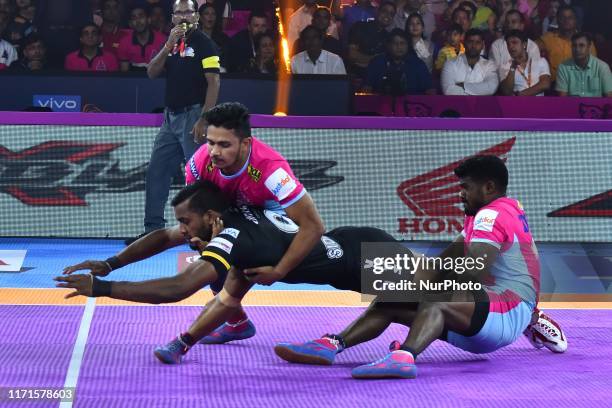 Players of Telgu Titans and Jaipur Pink Panthers in action during the Pro Kabaddi League match at SMS Indoor Stadium in Jaipur,Rajasthan, India, Sept...