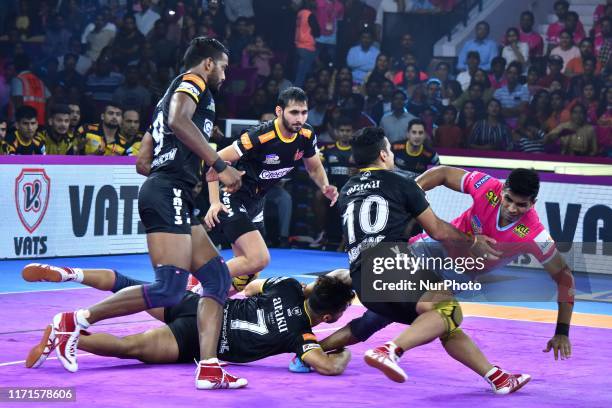 Players of Telgu Titans and Jaipur Pink Panthers in action during the Pro Kabaddi League match at SMS Indoor Stadium in Jaipur,Rajasthan, India, Sept...