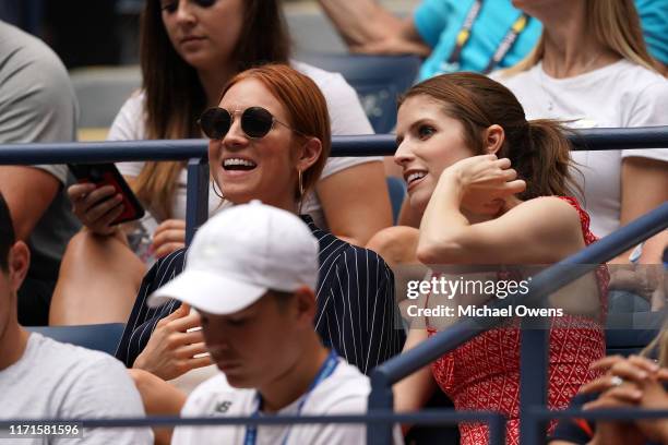 Brittany Snow, left, and Anna Kendrick attend the fourth round Women's Singles match between Serena Williams of United States and Petra Martic of...