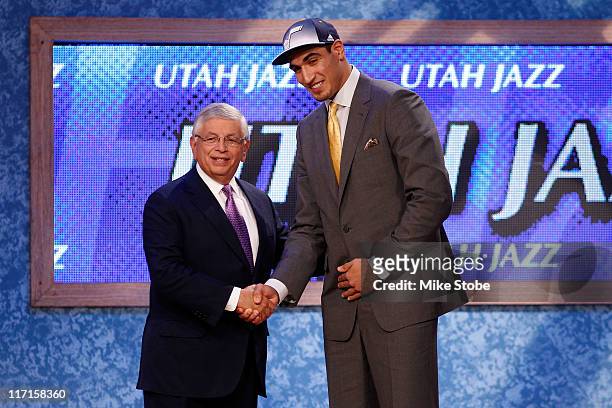 Enes Kanter from Istanbul, Turkey greets NBA Commissioner David Stern after he was selected overall by the Utah Jazz in the first round during the...