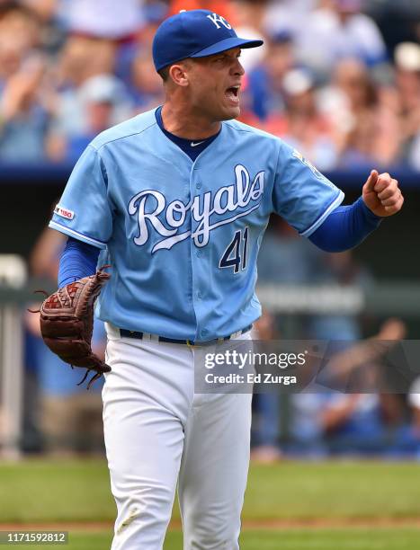 Starting pitcher Danny Duffy of the Kansas City Royals reacts to a double play in the sixth inning against the Baltimore Orioles at Kauffman Stadium...
