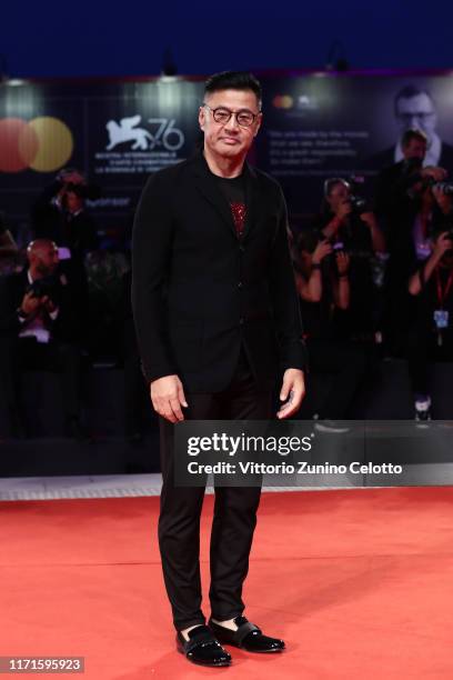 Yu Rongguang walks the Filming In Italy red carpet during the 76th Venice Film Festival at Sala Grande on September 01, 2019 in Venice, Italy.