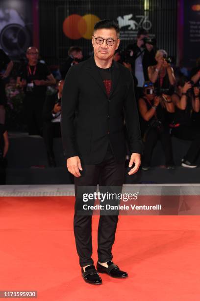 Yu Rongguang walks the Filming In Italy red carpet during the 76th Venice Film Festival at Sala Grande on September 01, 2019 in Venice, Italy.