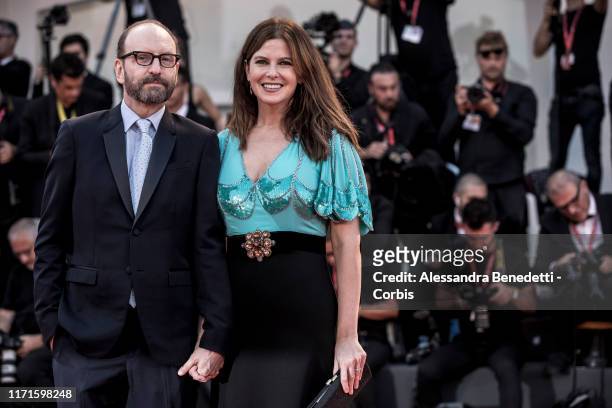 Steven Soderbergh and Jules Asner walk the red carpet ahead of the "The Laundromat" screening during the 76th Venice Film Festival at Sala Grande on...