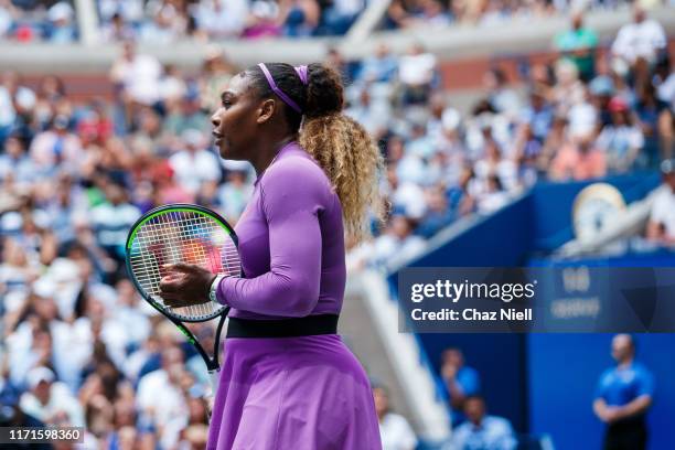 Serena Williams of the United States pauses during her fourth round Women's Singles match against Petra Martic of Croatia on day seven of the 2019 US...