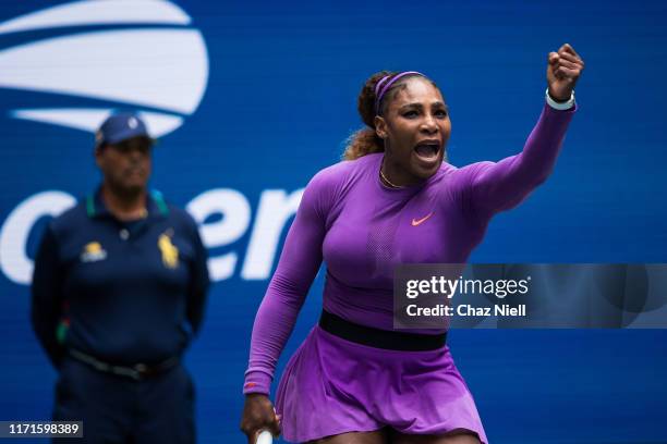 Serena Williams of the United States celebrates a point during her fourth round Women's Singles match against Petra Martic of Croatia on day seven of...