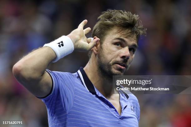 Stan Wawrinka of Switzerland reacts during his Men's Singles fourth round match against Novak Djokovic of Serbia on day seven of the 2019 US Open at...