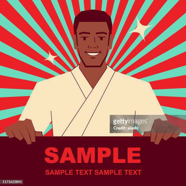 smiling handsome african ethnicity young man (karate, aikido, judo) holding blank sign - aikido stock illustrations