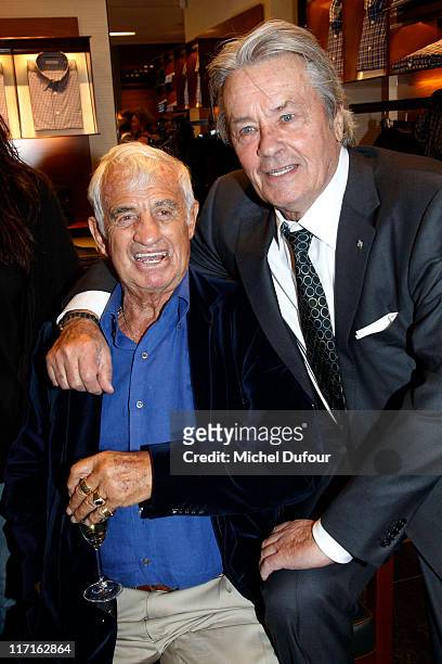 Jean Paul Belmondo and Alain Delon attend the Ermenegildo Zegna Flagship Opening In Paris on June 23, 2011 in Paris, France.