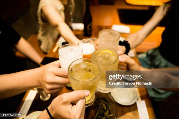 toasting people - happy hour foto e immagini stock