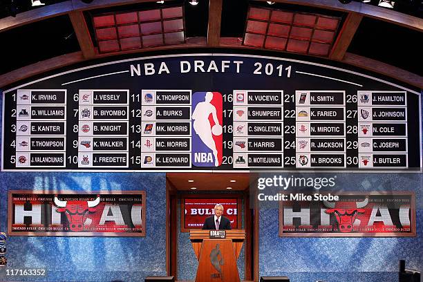 General view of the names on the draft board after the completion of the first round as NBA Commissioner David Stern speaks at the podium during the...