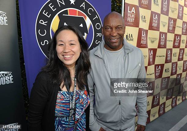 Ellen Huang and director John Singleton attends the "Boyz N The Hood" unofficial party during the 2011 Los Angeles Film Festival held at the Jameson...
