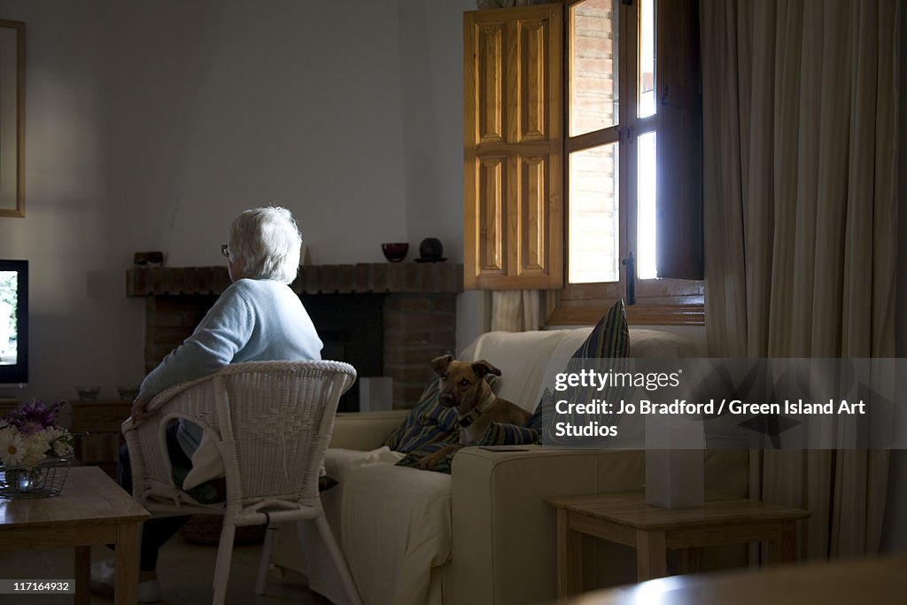 Old lady watchingTV