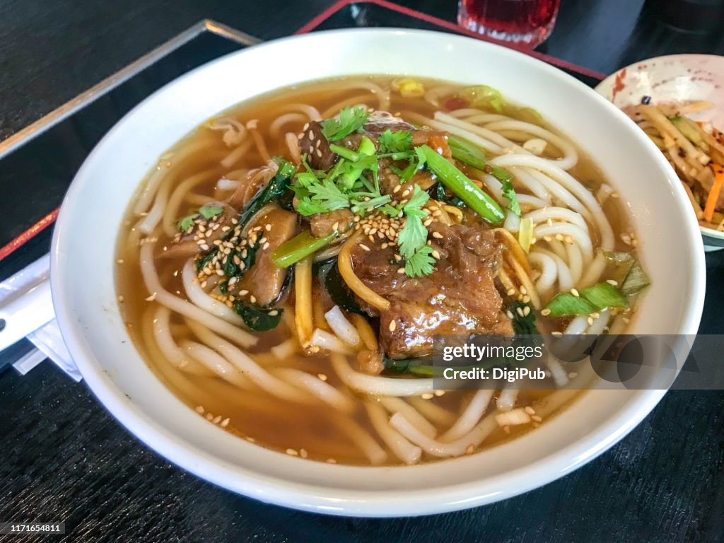 Rice noodles with braised beef ribs