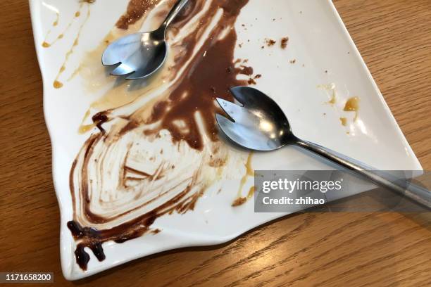 empty plate with ice cream - leerer teller stock-fotos und bilder