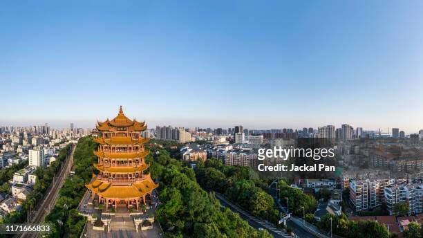 yellow crane tower at dusk - wuhan stock pictures, royalty-free photos & images