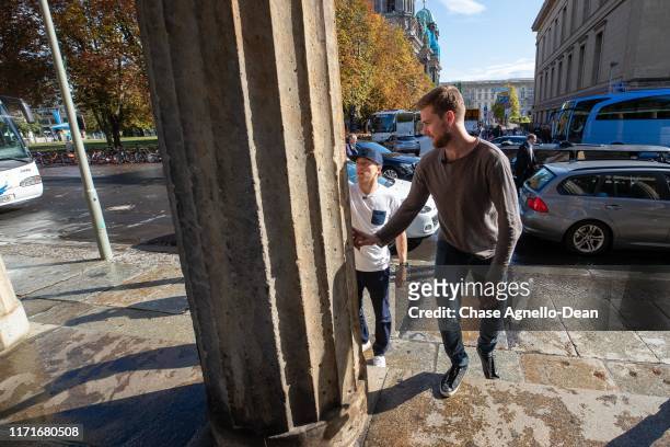 September 28 : Drake Caggiula and Calvin de Haan of the Chicago Blackhawks stop at the UNESCO Welterbestätte Museumsinsel during their tour of the...