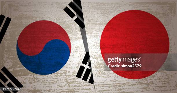 korea and japan flag with grunge texture background - korea japan stock illustrations