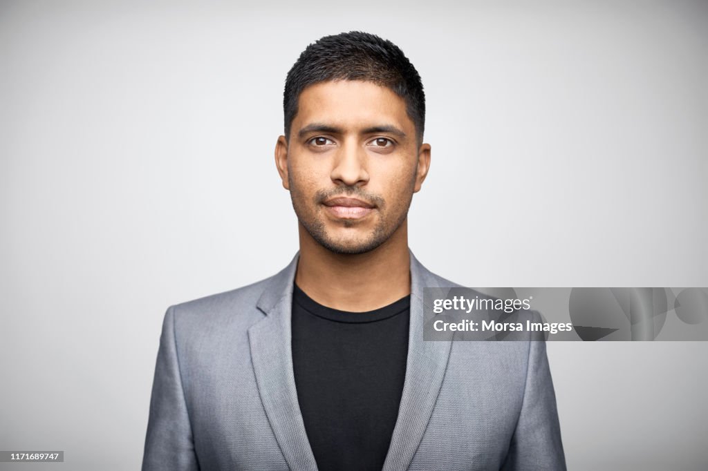 Well-dressed businessman against white background