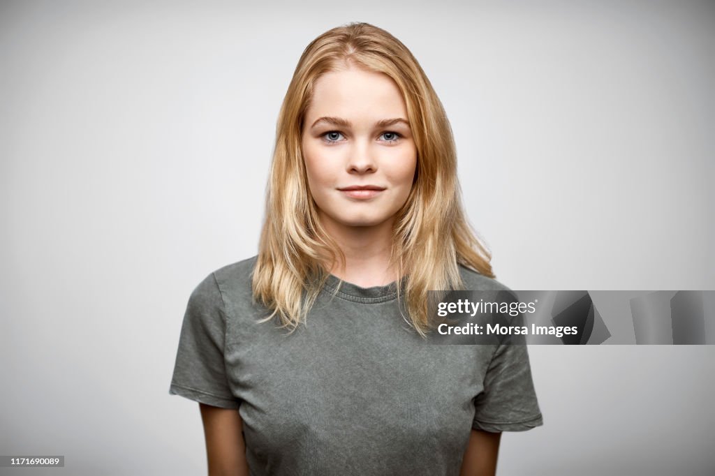 Portrait of beautiful female owner with blond hair