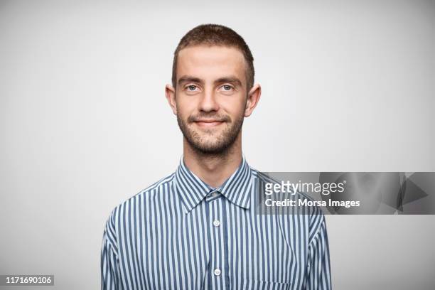 portrait of businessman wearing striped shirt - moustache isolated stock pictures, royalty-free photos & images