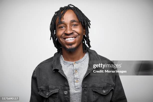 portrait of confident businessman wearing jacket - dreadlocks stock pictures, royalty-free photos & images