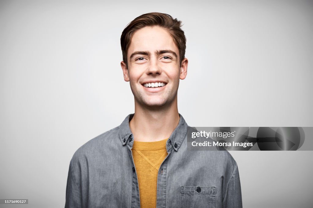 Handsome entrepreneur against white background