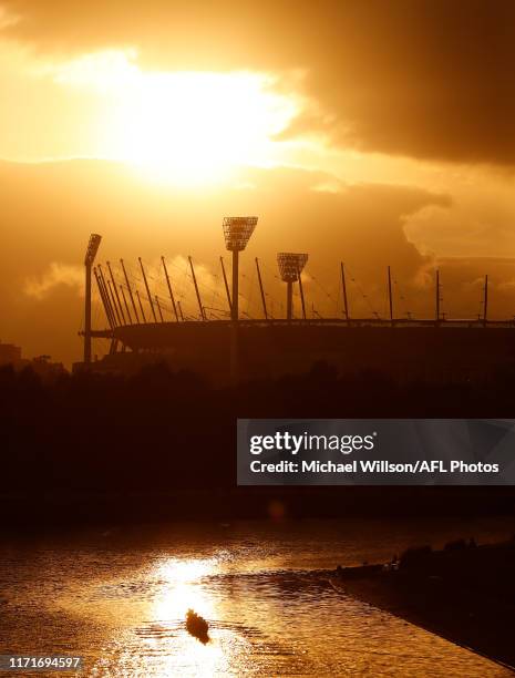 The sun rises over the MCG before the 2019 Toyota AFL Grand Final match between the Richmond Tigers and the GWS Giants at the Melbourne Cricket...