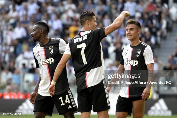 Cristiano Ronaldo of Juventus celebrates after scoring goal of 2-0 with teammates Blaise Matuidi and Paulo Dybala during the Serie A match between...