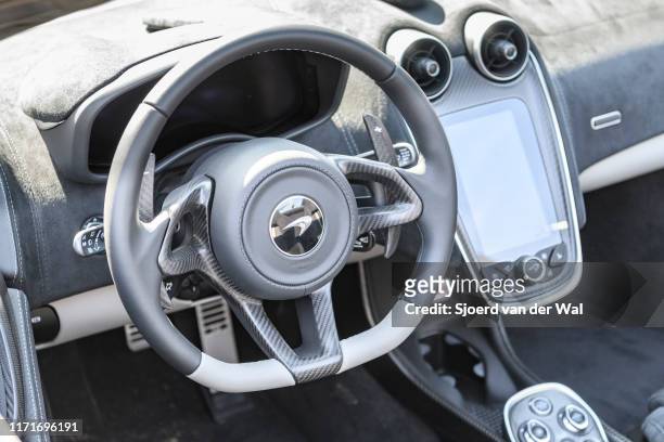 McLaren 570S Spider convertible sports car dashboard on display at the 2019 Concours d'Elegance at palace Soestdijk on August 25, 2019 in Baarn,...