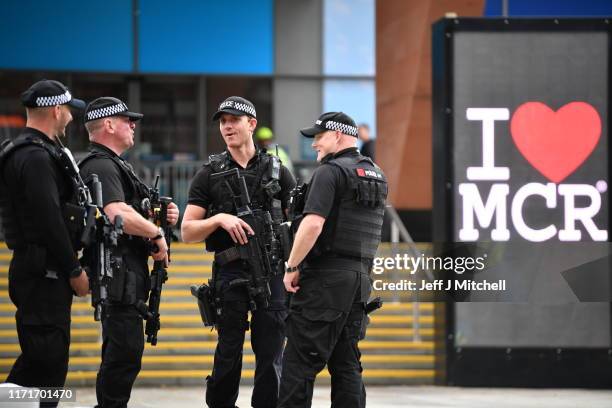 Armed Police are seen outside the Conservative Party Conference on September 28, 2019 in Manchester, England. Despite Parliament voting against a...