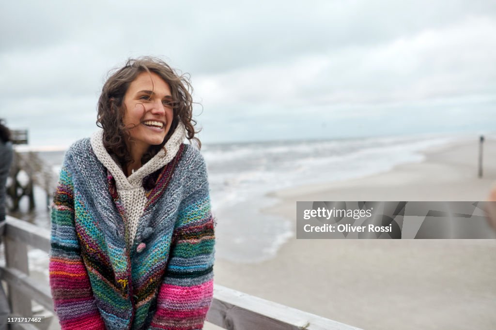 Happy woman by the sea