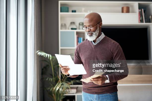 going through my statement for the month - bank statement stock pictures, royalty-free photos & images