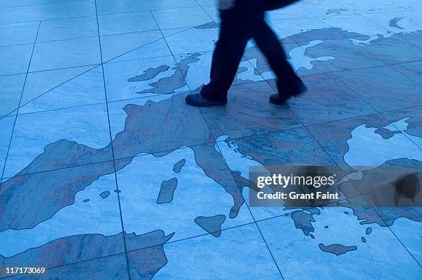 man walking on map. - eu trade stock pictures, royalty-free photos & images