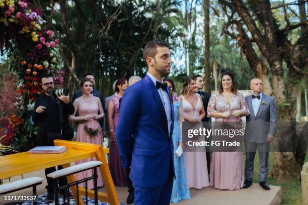groom waiting the bride in the altar - groom waiting at altar stock pictures, royalty-free photos & images
