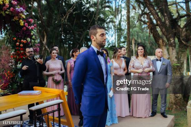 groom waiting the bride in the altar - altar stock pictures, royalty-free photos & images